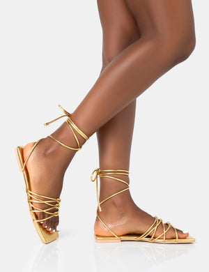 Gold tie sales up sandals flat