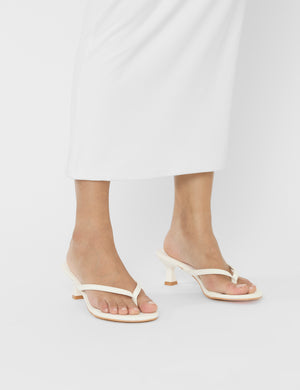 Evermore White Pu Thong Low Flared Heels