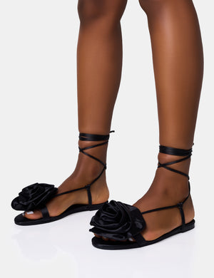 Magnolia Black Flower Corsage Lace Up Flat Sandals