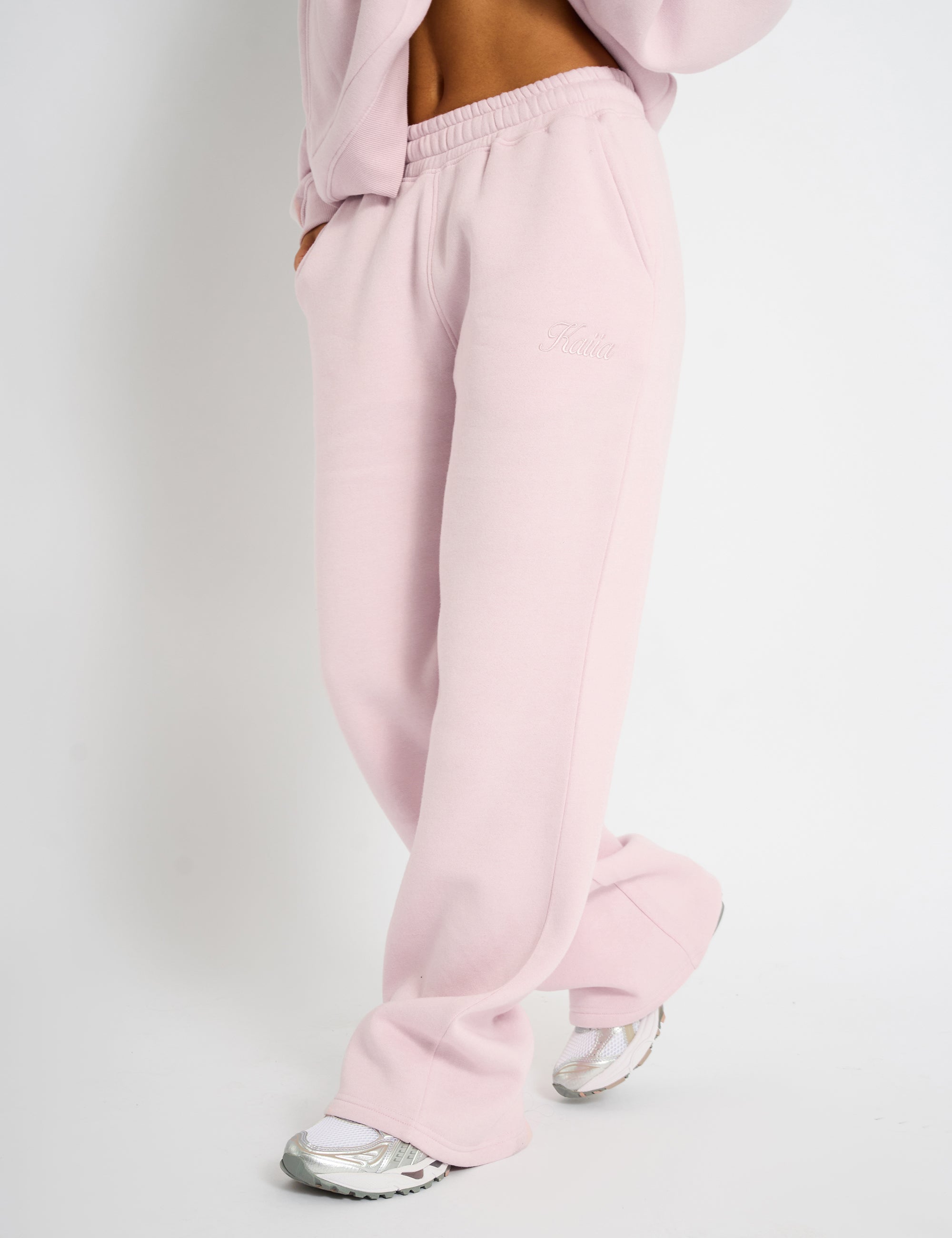 Pink and white joggers on sale