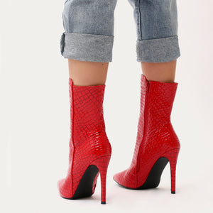 Chile Asymmetric Pointed Toe Ankle Boots in Red Faux Snake