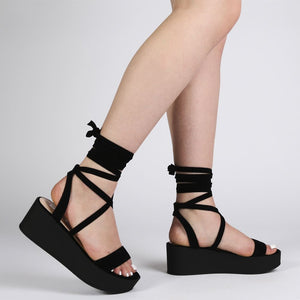 Diya Flatform Sandals in Black Faux Suede